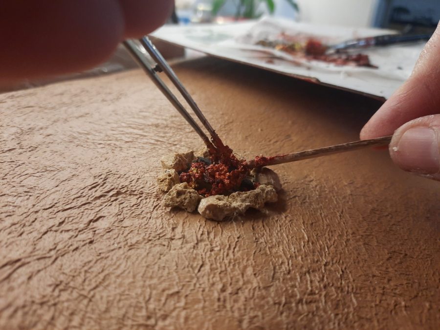 Making a Nativity diorama inside an antique steamer trunk: giving life to the bonfires