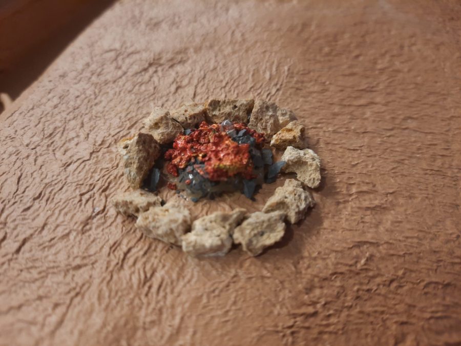 Making a Nativity diorama inside an antique steamer trunk: giving life to the bonfires