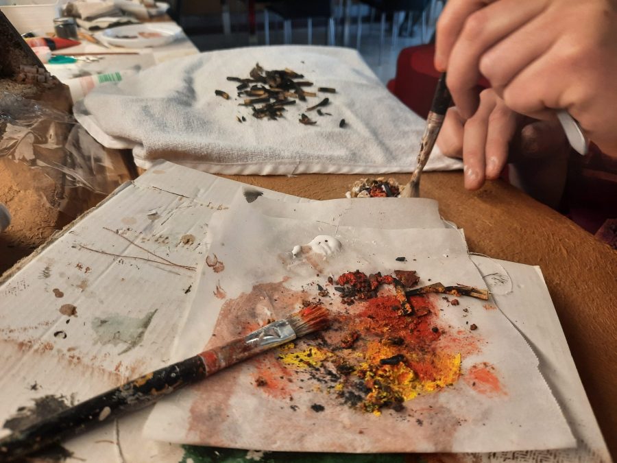 Making a Nativity diorama inside an antique steamer trunk: giving life to the bonfires