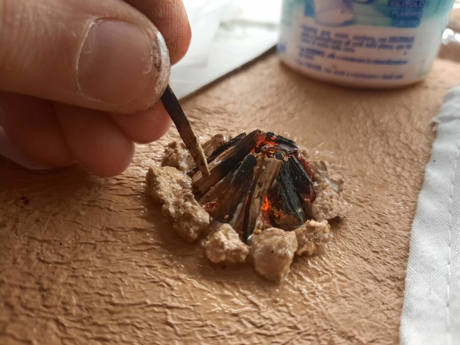 Making a Nativity diorama inside an antique steamer trunk: giving life to the bonfires