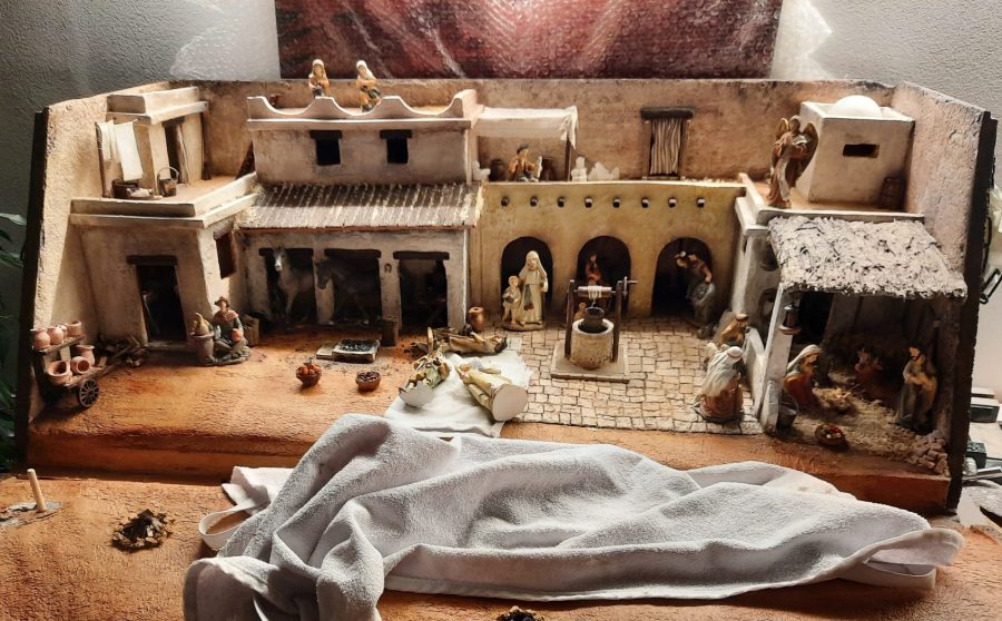 Making a Nativity diorama inside an antique steamer trunk. The town of Bethlehem with all its buildings and people, ready to receive the final details.