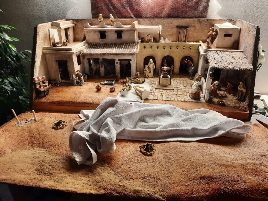 Making a Nativity diorama inside an antique steamer trunk: placing the statues