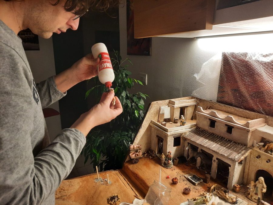 Making a Nativity diorama inside an antique steamer trunk: placing the statues