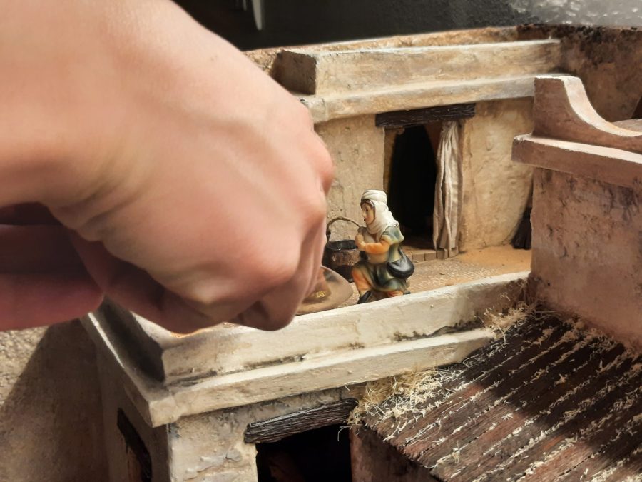 Making a Nativity diorama inside an antique steamer trunk: placing the statues