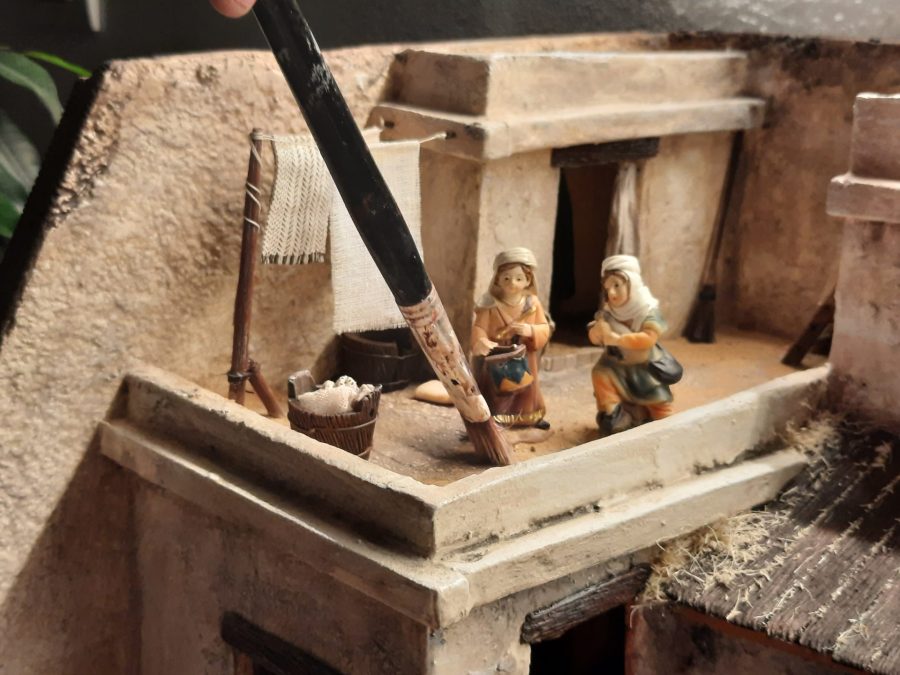 Making a Nativity diorama inside an antique steamer trunk: placing the statues