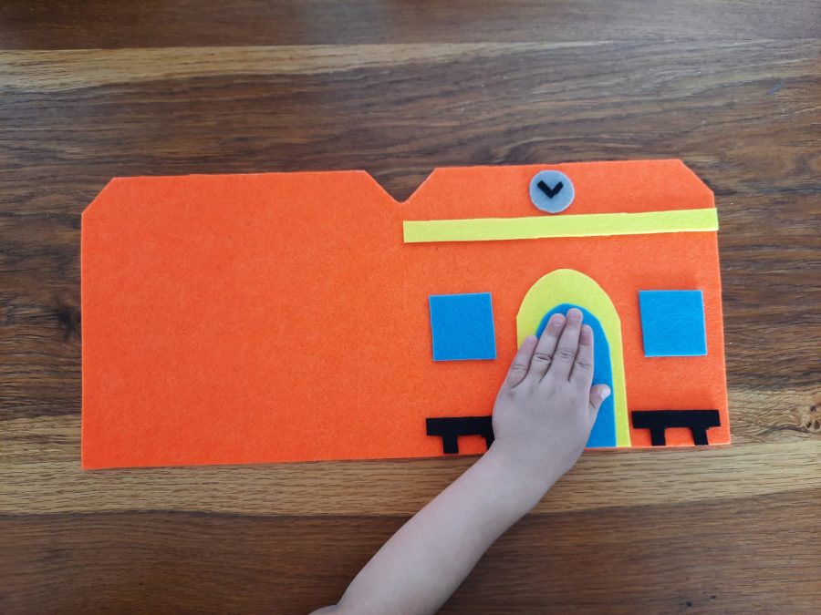 Making our felt bus book: the train station entrance (tiny daughter's hand for scale)