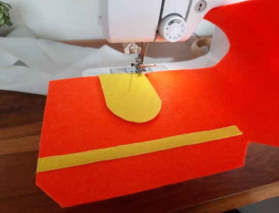 Making our felt bus book: the train station entrance