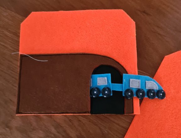Making our felt bus book: the tunnel with the train
