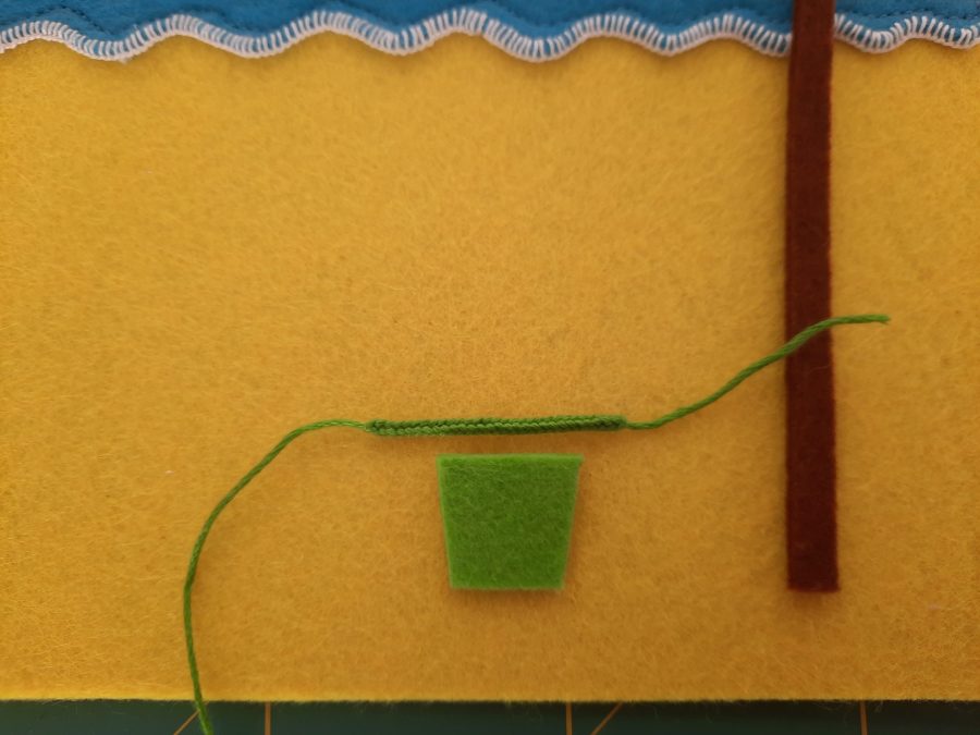 Making our felt bus book: the beach scene