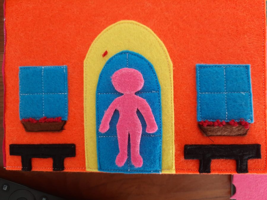 Making our felt bus book: the doll and her clothes