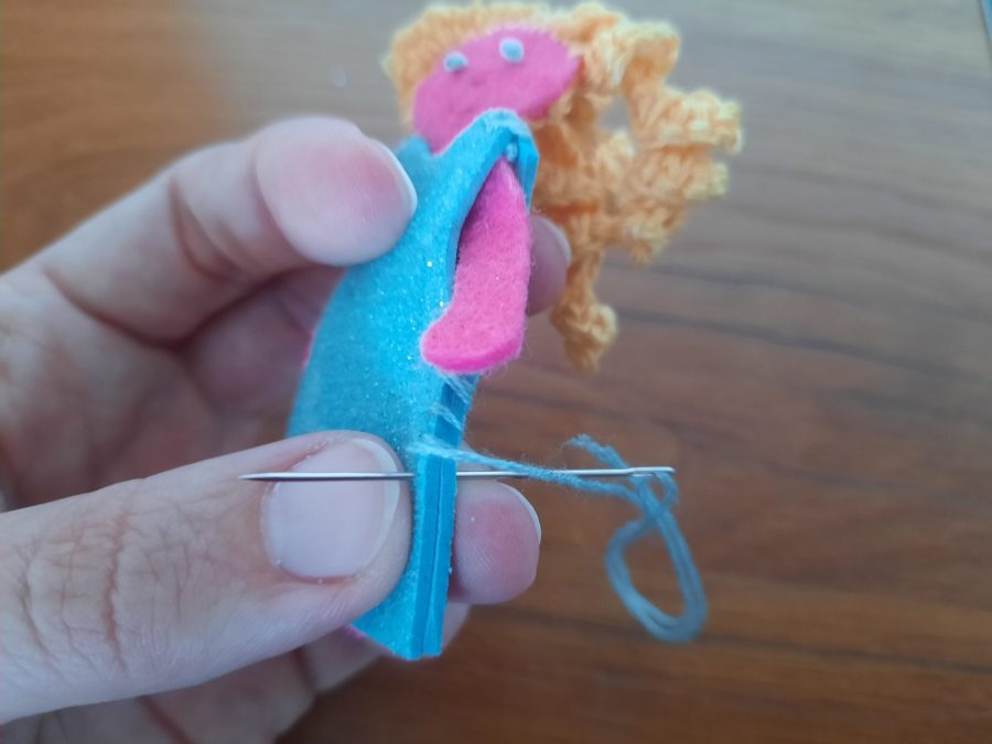 Making our felt bus book: the doll and her clothes