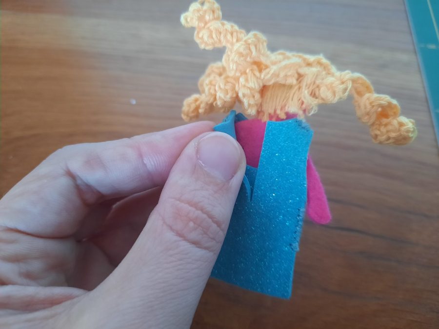 Making our felt bus book: the doll and her clothes