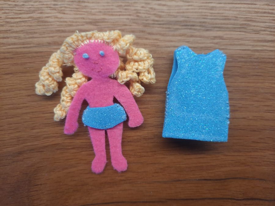 Making our felt bus book: the doll and her clothes