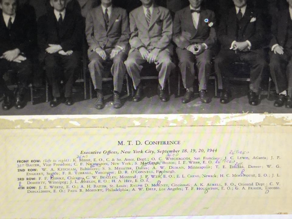 A group photo of Singer employees, with the names of the portrayed men. Lower front row on the left is Ken Meise's grandfather.